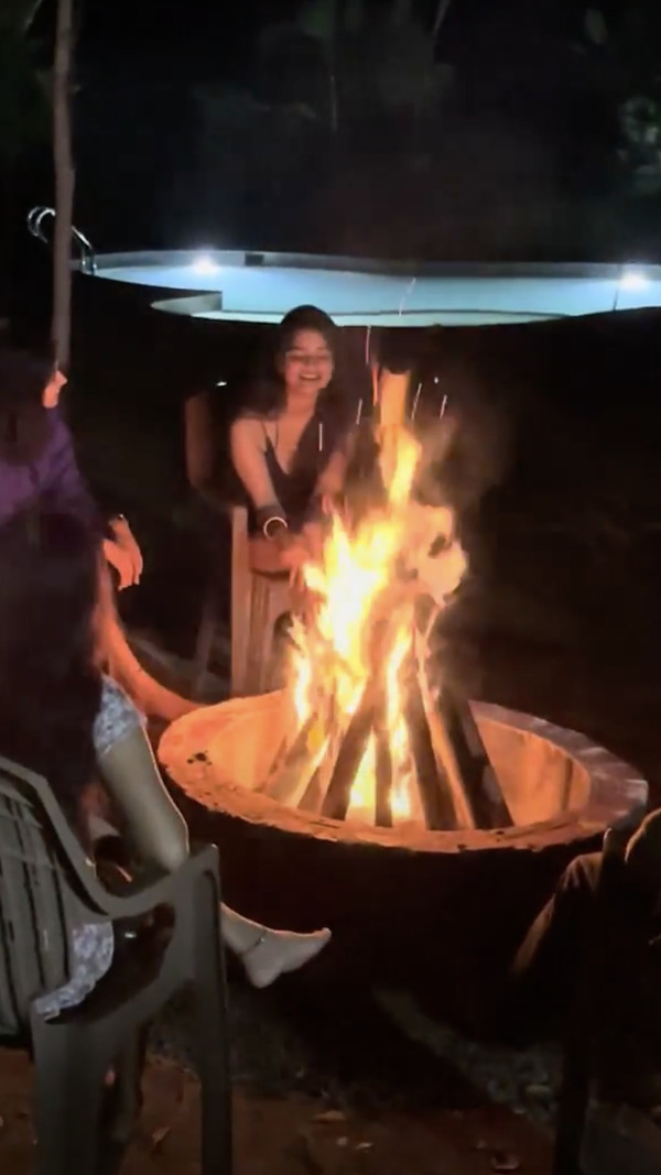 Bonfire under starry skies at a tranquil farm stay retreat near Bangalore