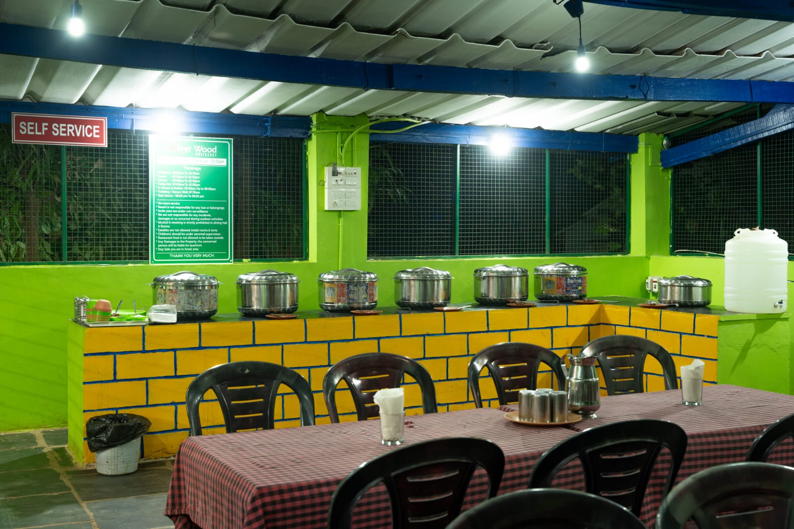 Enjoying a meal from the in-house restaurant at the dandeli homestay resort