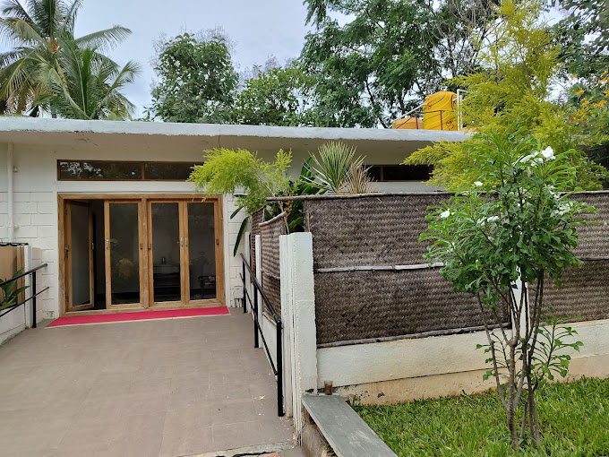 Traditional cottage exterior with modern interiors at Hide and Teak  