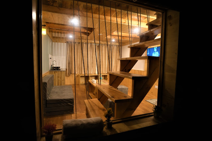 Relax by the bonfire at Mountainshack, Dobhi, Manali.